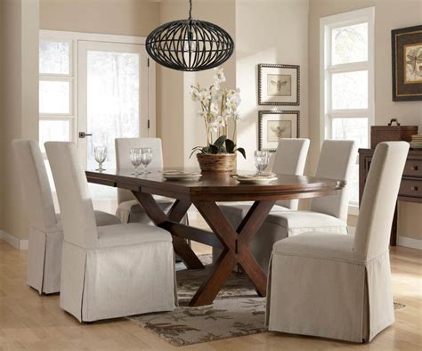 A slipcover is a fixed cover that may be slipped off and on a piece of padded furniture which. Elegant Slipcover for Dining Room Chairs - Stylish Look ...