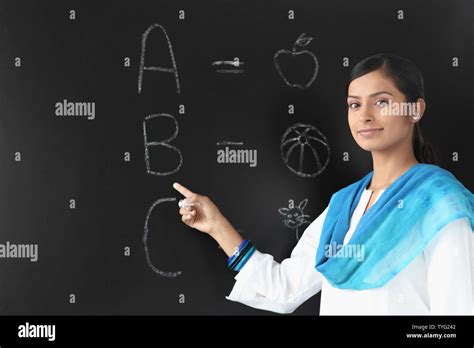 Indian Adult Woman Teacher Writing Hi Res Stock Photography And Images