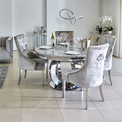 In the room above, muted teal blue side chairs are the perfect complement to a simple, white table. Oracle 130cm Round Grey Marble Dining Table & 4 Parker ...