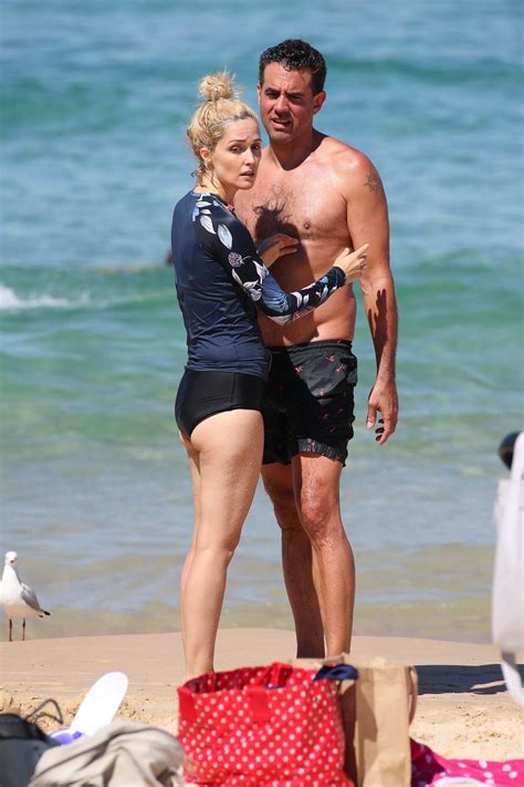 Rose Byrne Seen Wearing A Black Bikini During A Beach Day With Husband Bobby Cannavale At Bondi