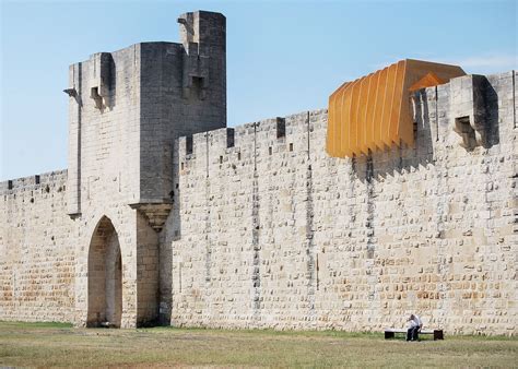Nas Architecture Installs Wooden Vortex Over Medieval Wall