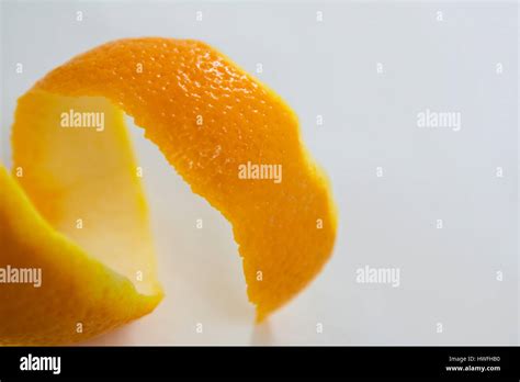 Close Up Of Spiral Orange Peel On White Background Stock Photo Alamy
