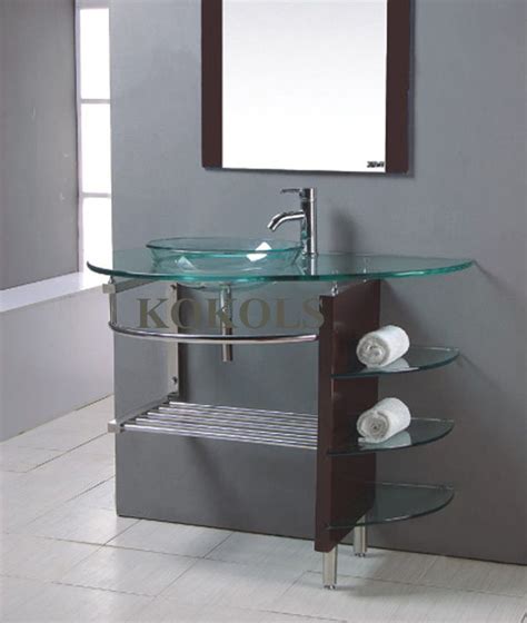 The vanity has one double door cabinet and four drawers providing ample storage space for your needs. modern Bathroom Glass bowl clear vessel Sink & wood Vanity ...