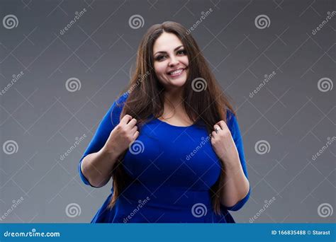 Happy Plus Size Model In Blue Dress Fat Woman With Long Hair On Gray Background Body Positive