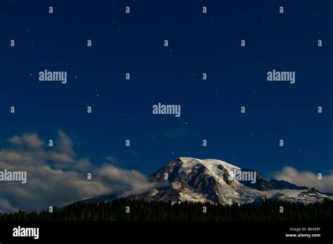 Night Shot Of Mount Rainier With Stars In The Night Sky Stock Photo Alamy