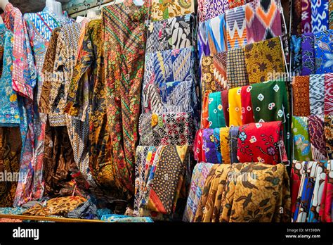 Colorful Selection Of Batik Clothing Displayed Outside Of A Batik Shop