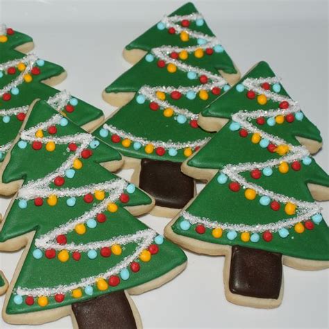 Christmas cookies decorated on wooden background with napkin and red ribbon, german. Decorated Tree Sugar Cookies - Sweet Seidner's Bake Shop