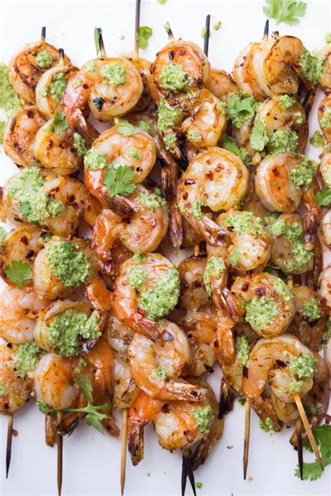 Grilled asian shrimp skewers make for the perfect starter at your next bbq or dinner party. Garlic Shrimp Skewers with Cilantro Pesto | Little Broken