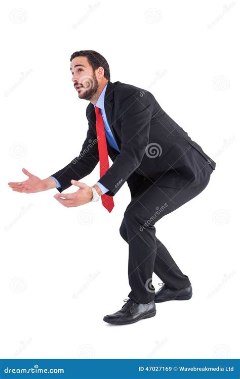 Bending Businessman Holding Hand Out While Looking Up Stock Image