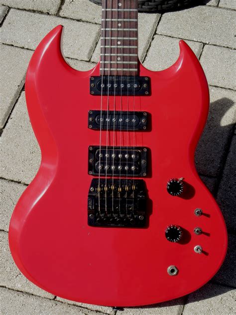 Every single detail has been reproduced with tremolo : Gibson SG Special 1985 Ferrari Red Guitar For Sale Guitarbroker