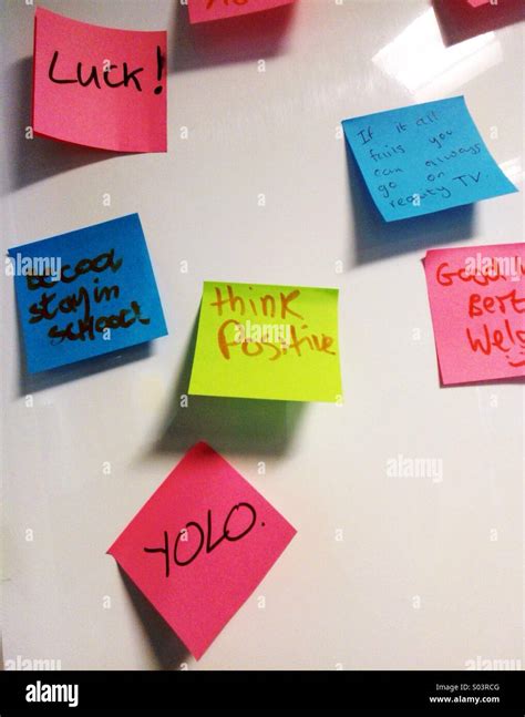 Inspirational Messages On Colour Post It Notes Left By Students Outside