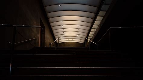 Download Wallpaper 2560x1440 Stairs Tunnel Dark Building Widescreen