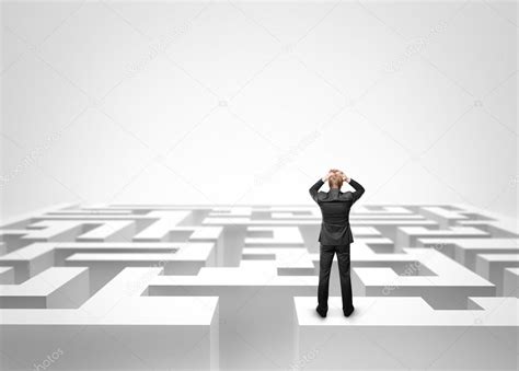 Businessman In Front Of A Huge Maze — Stock Photo © Kantver 24862629