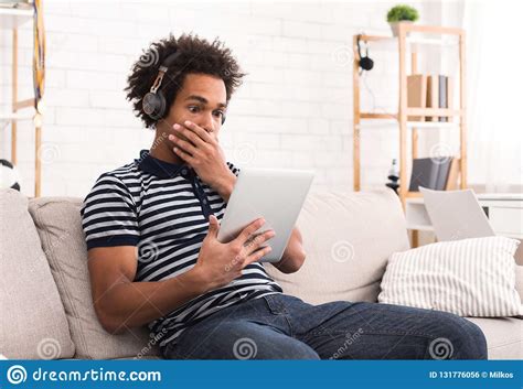 Young Shocked Teenager Chatting Online On Tablet Stock Photo - Image of internet, communication ...