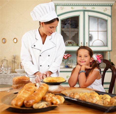 Mother Cook With Her Daughter Cooking Homemade Pastry Stock Photo By