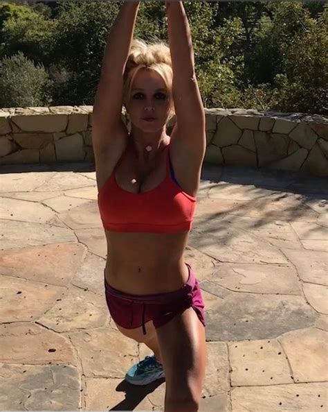 Britney Spears Boobs Burst Out Of Her Sports Bra As She Performs