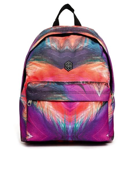 hype hype backpack in feather print at asos feather print backpacks festival backpack