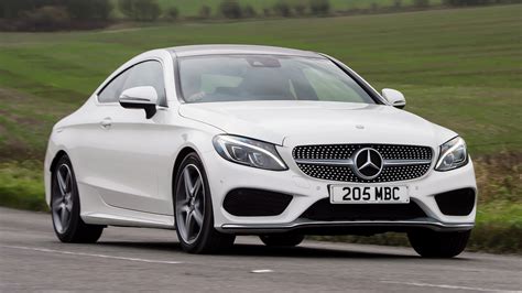 The interior benefits from an optional fully digital cockpit with distinctive amg displays and the new generation of steering wheels. 2015 Mercedes-Benz C-Class Coupe AMG Line (UK) - Wallpapers and HD Images | Car Pixel