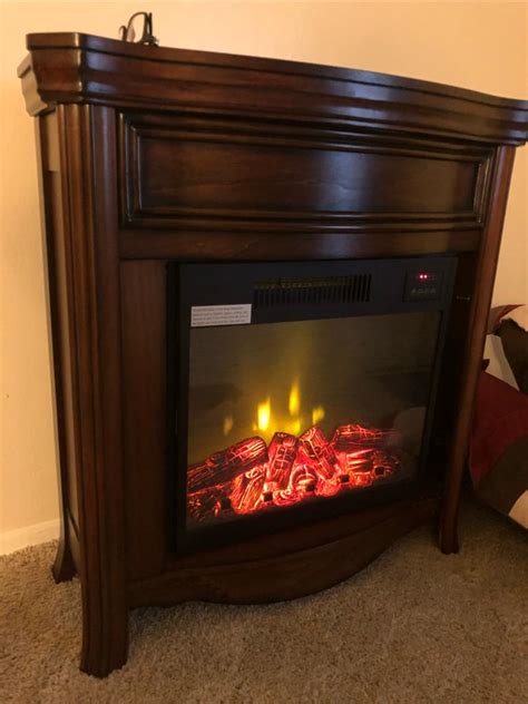 An electric fireplace is safe, easy to install and maintain, and highly energy efficient. Great World LTD Electric Fireplace Insert Heater model GW ...