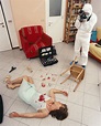 Photographing crime scene - Stock Image - H200/0123 - Science Photo Library