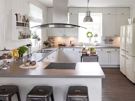 A combination of white painted cabinetry and rustic hickory cabinets create an earthy and bright kitchen. Gray Kitchen Countertops - Contemporary - kitchen - Hus & Hem