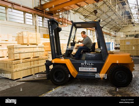 Forklift truck driver, warehouse, UK Stock Photo - Alamy