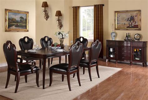 In a stately, broad white space, the dining room centers on a large beige area rug, with dark wood table. Simple and Formal Dining Room Sets - Amaza Design