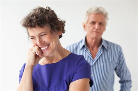 Free Photo Smiling Senior Woman And Husband Standing Behind