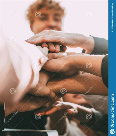 Group Of Diverse Young People Joining Their Palms Together Stock Image