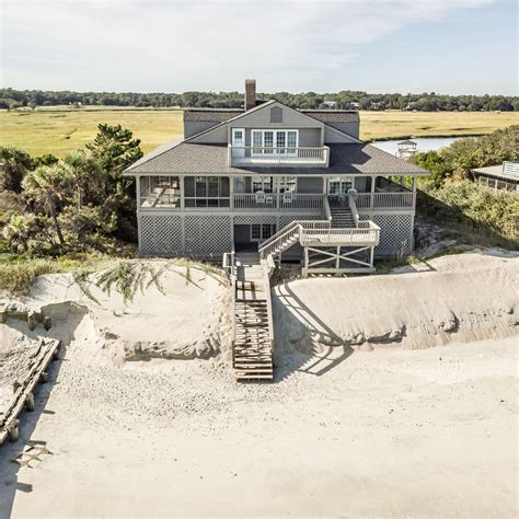 Rent a week in this gorgeous oceanfront 6 bedroom home with a creek