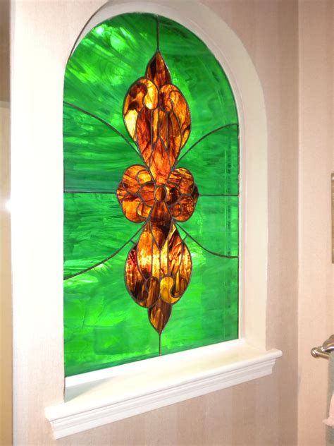 If you want to add a splash of color and texture to your bathroom, consider installing one of stained glass inc.'s custom stained glass window inserts. Bathroom stained glass window | Powder room decor, Stained ...