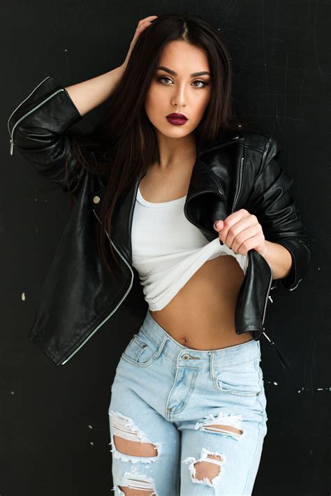 Sexy Female Model In Black Leather Jacket And Ripped Jeans Image Free