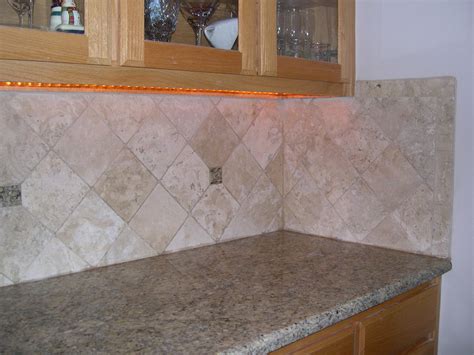 Like limestone, travertine tile is something of an institution. travertine backsplash | 6" tumbled travertine with granite ...