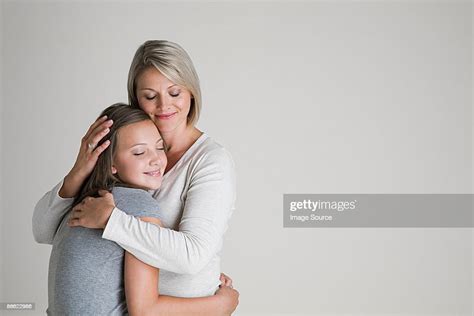 Mother And Daughter Hugging Photo Getty Images