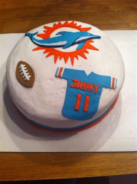 A truly unique gift for the miami or lego fan young or old! Miami Dolphins cake | Dolphin cakes, Miami dolphins cake ...