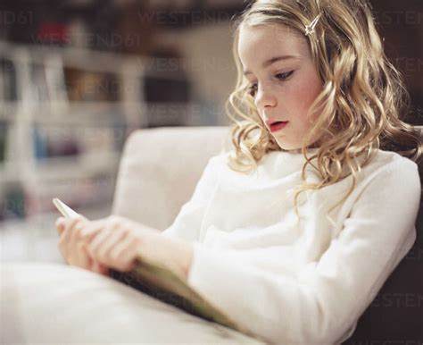 Young Girl Reading A Book Stock Photo