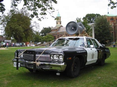 The car is described as a decommissioned mount prospect police car, purchased by elwood blues at an auction after he had traded a previous car (a 1968 cadillac sixty special) for a microphone. Dodge Monaco, Blues Brothers Bluesmobile | Cars movie ...