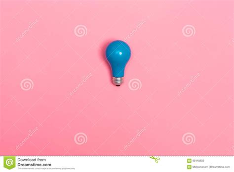 Blue Light Bulb On A Vibrant Background Stock Photo Image Of Bright