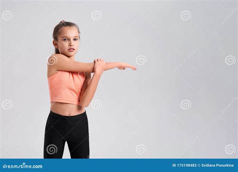 I Play Fitness Flexible Cute Little Girl Child Looking At Camera While