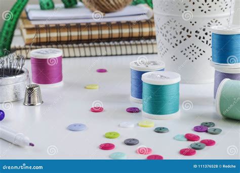 Spools Of Thread And Basic Sewing Tools Including Pins Needle A
