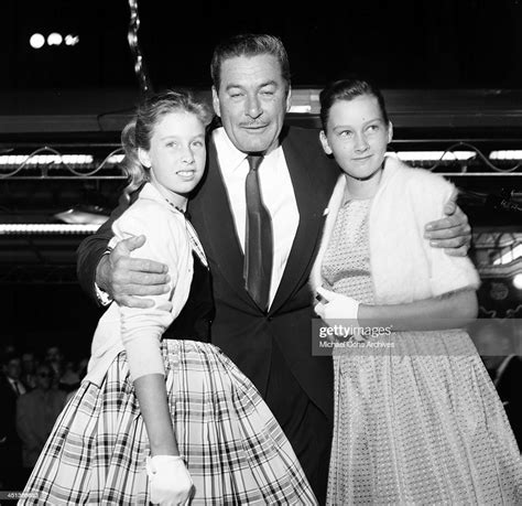 Actor Errol Flynn Poses With Daughters Deidre 12 And Rory 10 At The