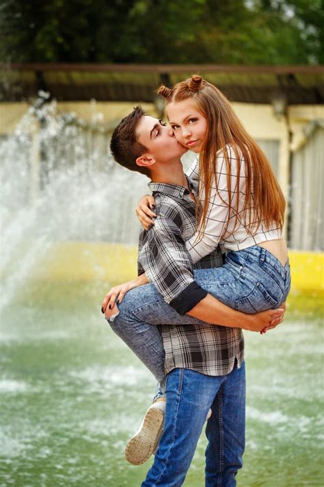 Enamoured Teenagers Hugged Strongly And Kiss Stock Image Image Of