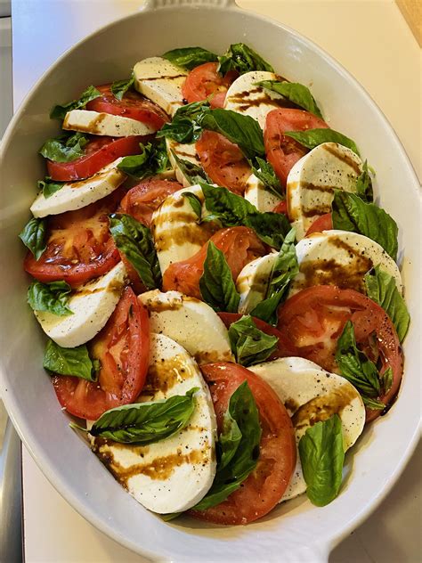Homemade Tomato Mozzarella And Basil Salad With Olive Oil And