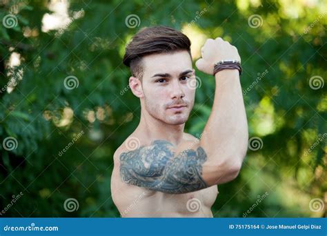 Young Boy With Showing His Muscles Stock Photo Image Of Fashion