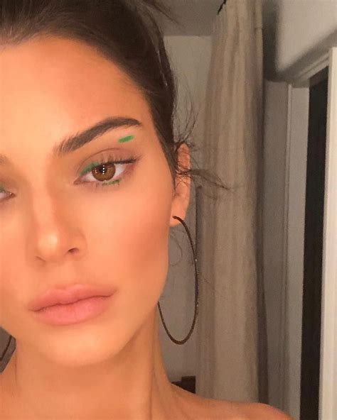 Kendall Jenner Debuts Radical Eyeliner And A Plunging Decolletage At
