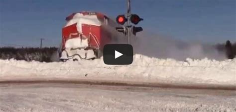 Stunning Video Captures Train Plowing Through Deep Snow Videos4uandi