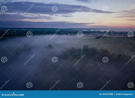 Pre Dawn Foggy Landscape The River And Meadow Are Covered With Fog