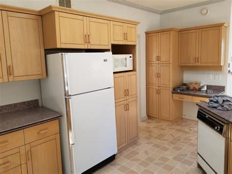 Renovating a home can be as simple as upgrading kitchen cabinets and flooring or constructing a storage space to c. $800 kitchen cabinets set Saanich, Victoria