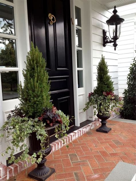 20 Impressive Ways To Frame Your Front Door With Planters Shelterness