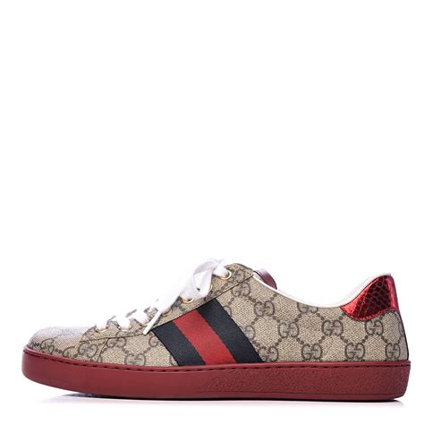 Beige/ebony gg supreme canvas, a material with low environmental impact with blue leather detail on the heel of one shoe and red on the other. GUCCI GG Supreme Monogram Ayers Mens New Ace Low-Top ...